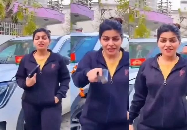 Video Viral: सिस्टम सिस्टम करते हो सिस्टम हिलवा देंगे…जिस दिन चाहेंगे गोली चलवा देंगे गाने पर हाथ में पिस्टल लेकर युवती का वीडियो वायरल